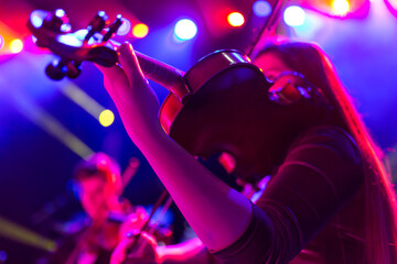 Woman playing the violin during a concert © Oleksandr