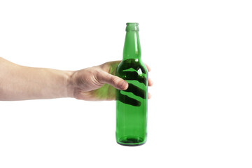 Glass bottle in hand on a white background. Empty bottle. Green bottle on a clean background