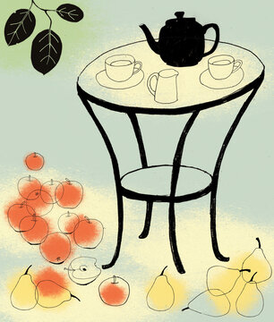 Tea on table surrounded by apples and pears