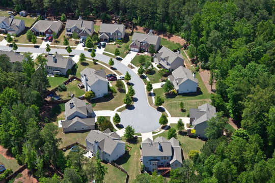 Aerial view of typical suburban cul-de-sac neighborhood street and homes in the eastern United States