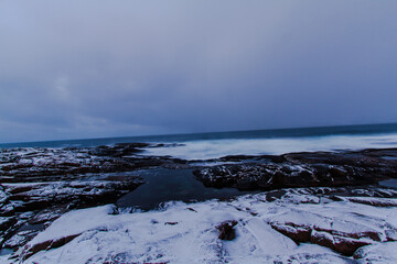 Winter view of the shore of the Arctic Ocean. General view of the day on the shore of the Arctic Ocean.