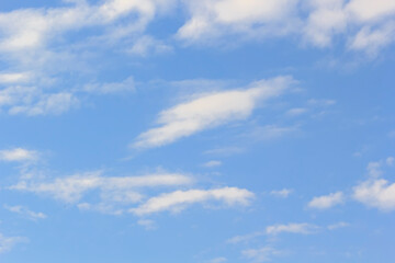 beautiful white cloudy on blue sky background at noon in Thailand