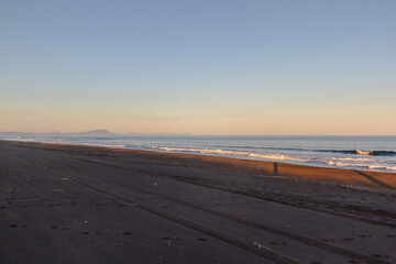 View of the Pacific coast during a sunny sunset on a clear sunny day.