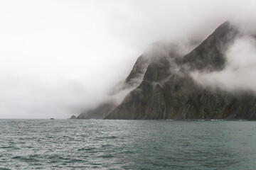 View of the sea bay during bad weather, fog, rain, strong wind