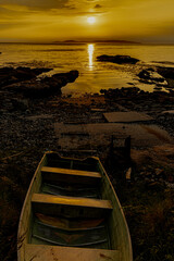 Golden Hour Sunrise in Murlough Bay, County Antrim, Causeway Coast and Glens Area of Outstanding Natural Beauty. Northern Ireland