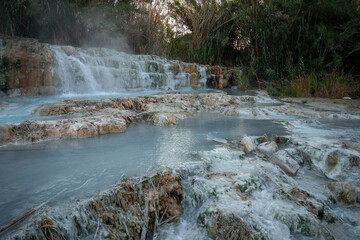 Saturnian natural spa with waterfalls and hot springs at  thermal baths in Tuscany, Italy