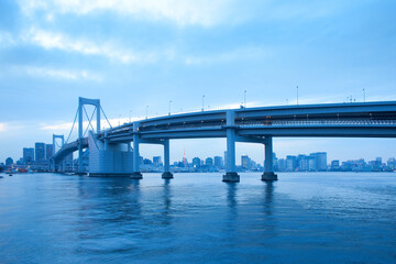 Fototapeta na wymiar Rainbow Bridge and city skyline at Odaiba, Tokyo, Kanto Region, Honshu, Japan