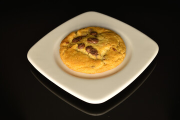 Homemade cookies with chocolate, close-up, on a white background.