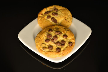 Homemade cookies with chocolate, close-up, on a white background.