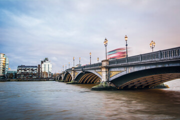 Fototapeta na wymiar London- Battersea Bridge over the River Thames, linking Battersea with Chelsea and central London