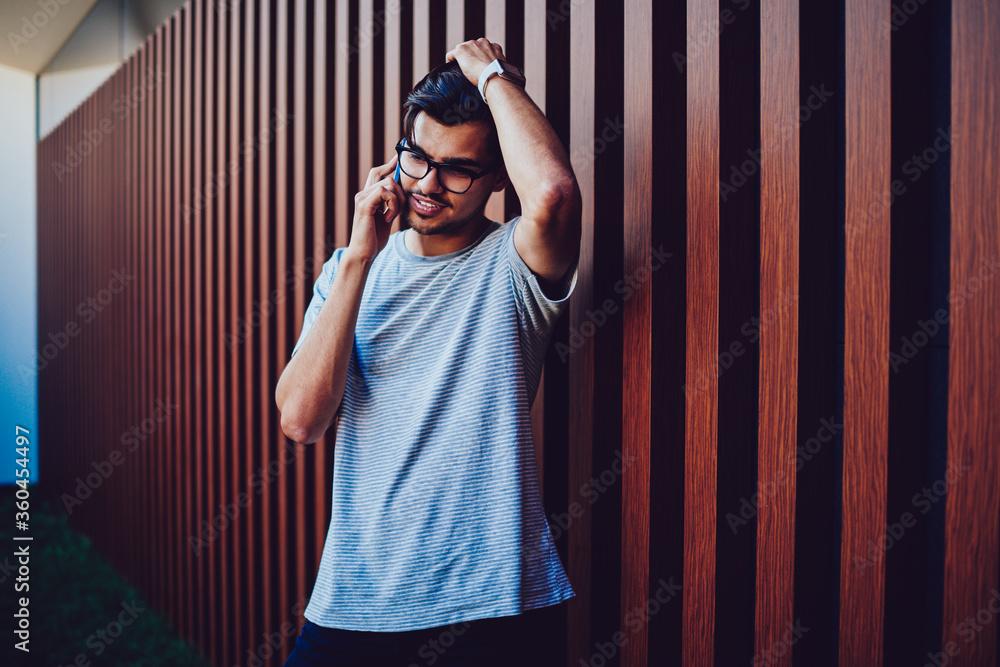 Poster hipster guy disappointed with having low balance for making phone calls trying to contact operator, 