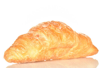 Homemade croissants, close-up, on a white background.