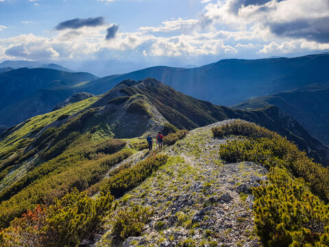 Hikers on Piule  Ridge, Piule Iorgovanu Mountains, Romania