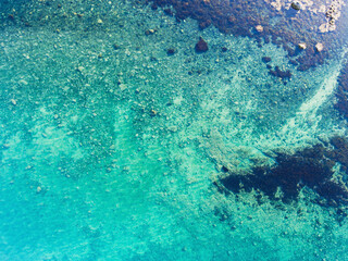 Blue sea water texture aerial drone view, water surface shot from drone, Norway, Finnmark