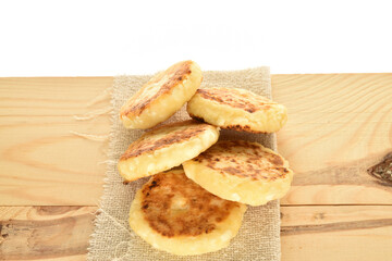 Homemade cheesecakes, close-up, on a white background.