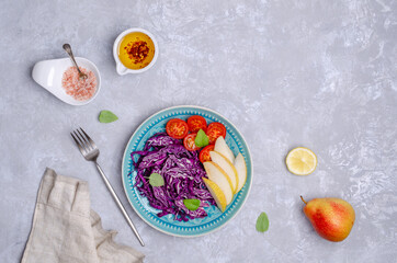 Fototapeta na wymiar Salad fresh vegetables with pears