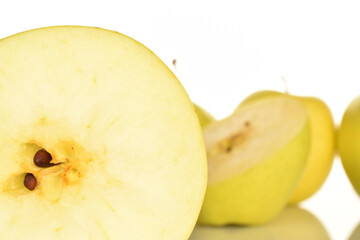 Yellow apples, close-up, on a white background.