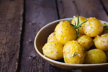 Baked potatoes with herbs and garlic