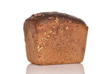 Black cereal bread, close-up, on a white background.
