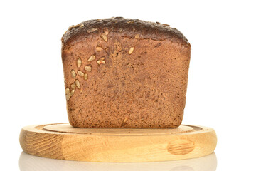Black cereal bread, close-up, on a white background.