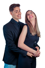 Young couple making funny faces and gestures on a white background