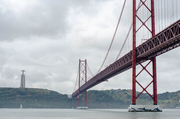 Fototapeta na wymiar 25th of April Suspension Bridge over the Tagus river in Lisbon, Portugal