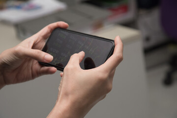 Working women looking for information on the phone