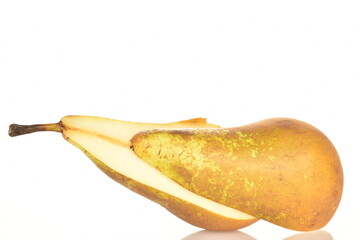Two half juicy pears on a wooden tray on a white background.