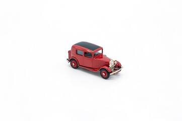 Children's toy Red fire truck close up on white background