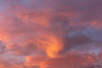Fototapeta na wymiar Epic dramatic sunrise, sunset pink violet orange sky with storm clouds background texture 