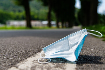 Surgical mask thrown on the street