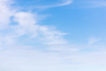 White clouds on a blue sky as background