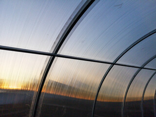Frame for the greenhouse at sunset