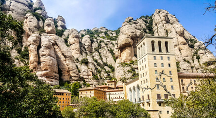 Benedictine abbey Santa Maria de Montserrat on a multi-peaked rocky range Montserrat. Barcelona,...