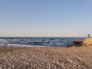 Fishing moment on the beach 