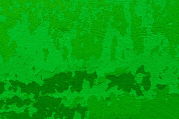 Obraz premium Green cracked background. Cracked wall with different shades of green.