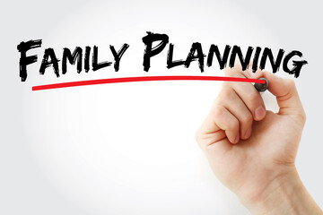 Family planning text with marker, concept background