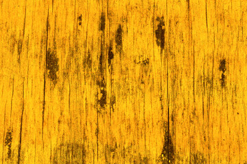 Old yellow painted wood surface board background texture, close up