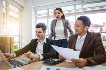 Group of  business discussing and working with laptop computer.creative business people planning and brainstorm at office. meeting and teamwork concept.