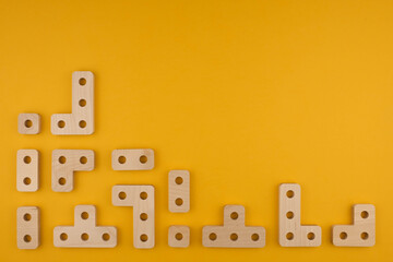 Children's wooden toy sorter close up with copy space. Concept of educational games and tetris. Copy space