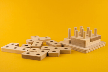Children's wooden toy sorter. Educational logic toys for kid's close-up. Montessori Games for child development