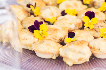 Catering service. Catering food. Table with food at event. Beautifully decorated catering banquet table with different food snacks and appetizers with sandwich.