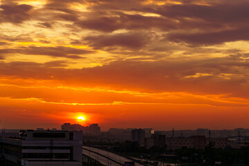 The alarming colors of sunset over summer Moscow
