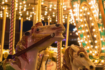 Merry-go-round amusement ride at  winter wonderland Christmas funfair in London