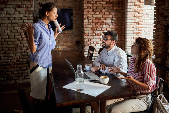 angry cafe owner is arguing with freelancer who ordered two coffees and sitting whole day in cafe