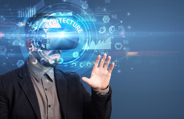 Fototapeta premium Businessman looking through Virtual Reality glasses with ARCHITECTURE inscription, innovative technology concept