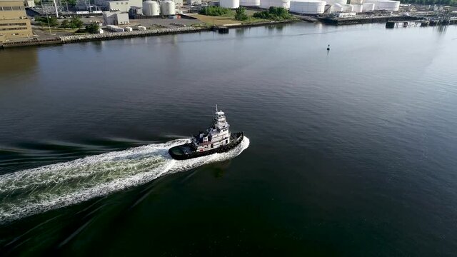 Aerial view of a tugboat along the Arthur Kill between New York and New Jersey