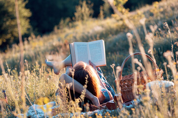 girl reads a book