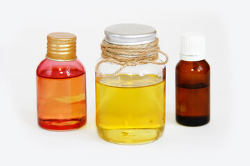 glass colored bottles with yellow aromatic a oil