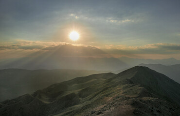 Mountain peaks in fog scenery landscape
